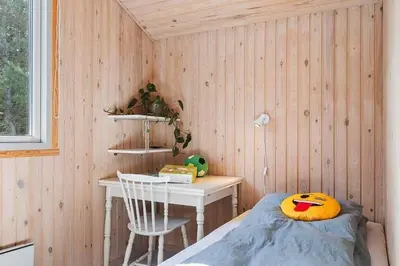 a room with a desk and a bed and a table at BL1293-Saltum-Havmandens-Vej-24 in Saltum