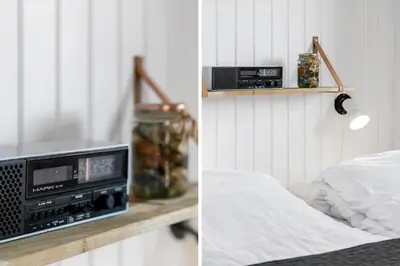 a bedroom with a bed and a tv and a bed at 157-Harboore-Vejlby-Klit-65 in Harboør