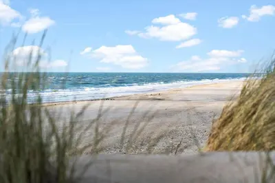 a view of a beach with the ocean at 362-Harboore-Gloryvej-6 in Harboør