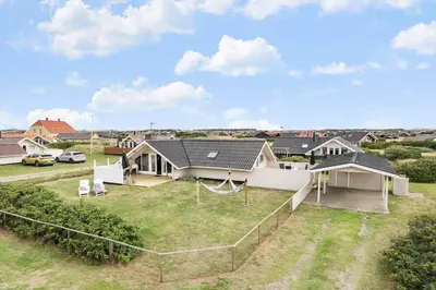 an aerial view of a house with a yard at 274-Harboore-Vejlby-klit-291 in Harboør