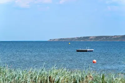 a boat in the middle of a large body of water at G287-Lemvig-Bellisvej-87 in Lemvig