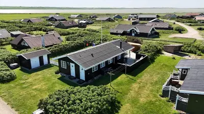 an aerial view of a village with houses at 251-Harboore-Neerlandiavej-230 in Harboør