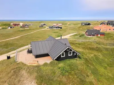 an overhead view of a house in a field at 257-Harboore-Dalevej-8 in Harboør