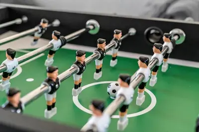 a group of toy toy men playing with a soccer ball at 272-Harboore-Neerlandiavej-196 in Harboør