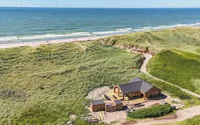 an overhead view of a house on the beach at 293-Harboore-Nautilusvej-16 in Harboør