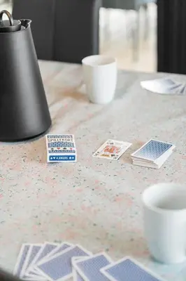 a table with a lamp and a counter top withnum at 260-Harboore-Strandvejen-158-C in Harboør