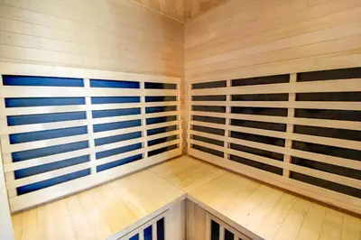 a small sauna with wooden walls and wooden floors at 260-Harboore-Strandvejen-158-C in Harboør