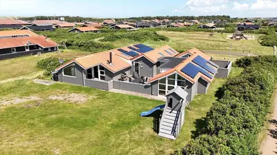 an aerial view of a home with a house at 149-Harboore-Vejlby-Klit-175 in Harboør