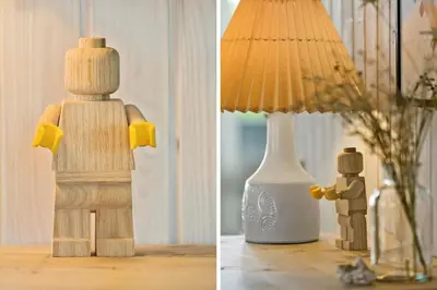 a lego man sitting on a table next to a lamp at 273-Harboore-Neerlandiavej-146 in Harboør