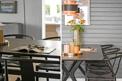 a dining table with a vase of flowers and a table with chairs at G246-Lemvig-Skovstjernevej-57 in Lemvig