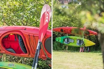 a couple of kayaks sitting on top of a car at G217-Lemvig-Violvej-17 in Lemvig