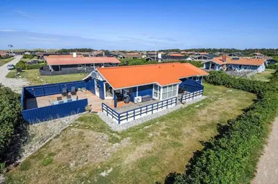 an overhead view of a house with an orange roof at 118-Harboore-Vejlby-Klit-121 in Harboør
