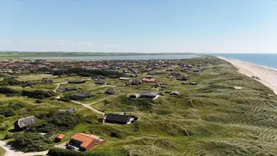 an aerial view of a village next to the beach at 218-Harboore-Dalevej-6-a in Harboør