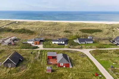 an aerial view of a group of houses on the beach at 385-Harboore-Charlottevej-11 in Harboør