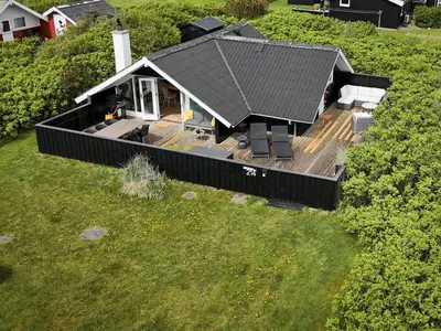 an overhead view of a house with a deck at 804-Harboore-Neerlandiavej-214 in Harboør