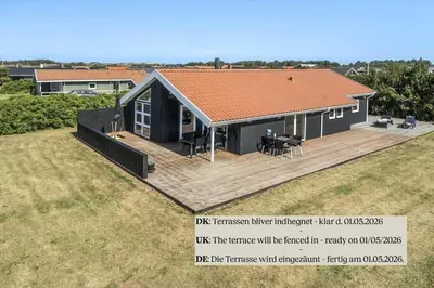 an image of a house with a large deck at 808-Harboore-Neerlandiavej-44 in Harboør