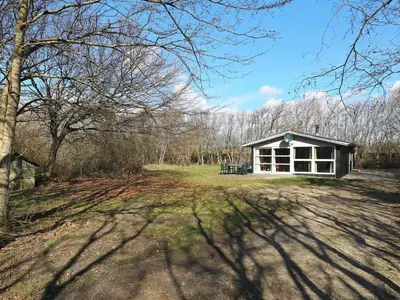 a small house in the middle of a field at 6 person holiday home in Hurup Thy-By Traum in Sindrup