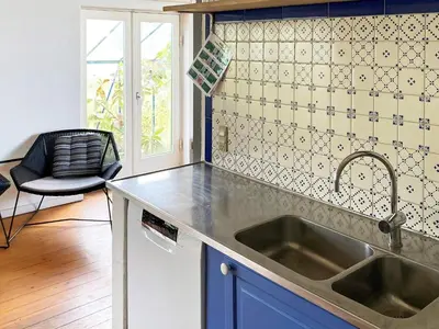a kitchen with a sink and a counter top at Scenic Retreat in Boddum - By Traum Ferienwohnungen in Boddum