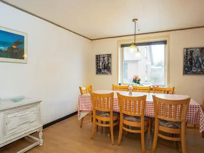 a dining room with a table and chairs at 10 person holiday home in Karby-By Traum in Karby