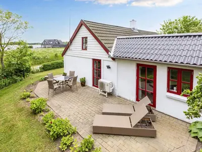 an aerial view of a white house with a patio at 6 person holiday home in Thisted-By Traum in Thisted
