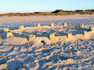 a sand castle on the beach at 6 person holiday home in Løkken in Løkken