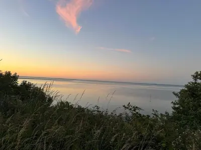 a view of a body of water at sunset at 8 person holiday home in Lemvig-By Traum in Lemvig