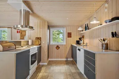 a kitchen with a sink and a counter top at BL1107-Blokhus-Soren-Petersvej-16 in Blokhus