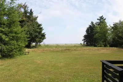 a park with a bench in a field with trees at LF14258-Fur-Marehalmvej-8 in Fur