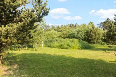 a green field with a tree in the foreground at LF10320-Hurup-Thy-Nattergalevej-2-B in Sønder Ydby