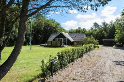 a small cabin in the middle of a field at LF12017-Spottrup-Albaekparken-144 in Spottrup
