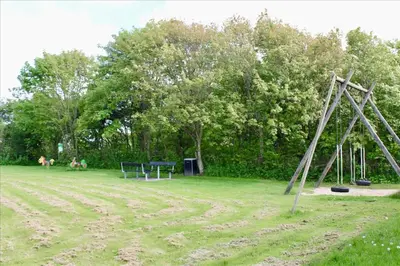 a group of people playing in a park with a playground at LF112-Vestervig-Ingeborgs-Alle-12 in Vestervig