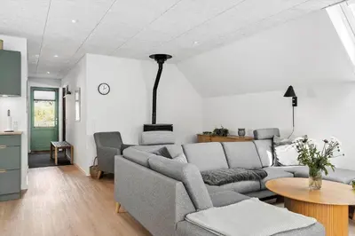 a living room with a couch and a table at LF11122-Struer-Plantagevej-22 in Struer