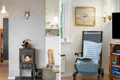 two images of a living room with a stove and a chair at LF10221-Thyholm-Haervej-21 in Thyholm