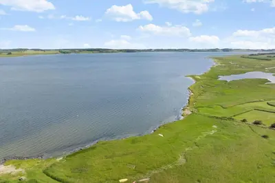 an aerial view of a large body of water at LF10221-Thyholm-Haervej-21 in Thyholm