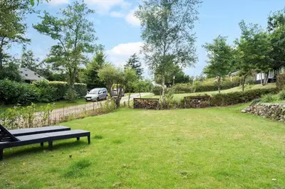 a park with a bench in the grass at LF11108-Struer-Barsidalvej-8 in Struer