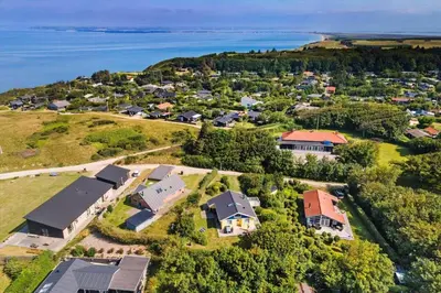 an aerial view of a house on a hill next to the water at LF11111-Struer-Granvej-11 in Struer