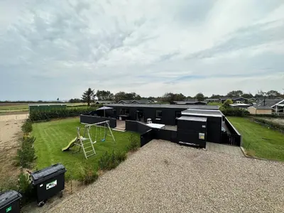 an aerial view of a house with a playground at LF12086-Vinderup-Vigen-86 in Vinderup
