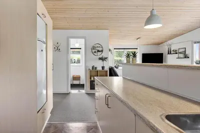 a kitchen with a sink and a counter top at LF11103-Struer-Blabaervej-3 in Struer