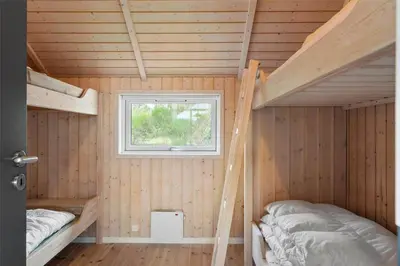 a room with two bunk beds and a window at LF21631-Spottrup-Vibevej-3 in Spottrup