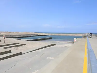 a walkway leading down to the beach with water at 6 person holiday home in Thisted in Thisted