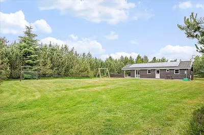 a large yard with a house and a soccer field at JB699-Fjerritslev-Revlingestien-43 in Fjerritslev