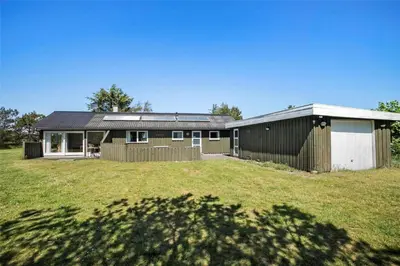 a house with a large yard in front of it at JB785-Fjerritslev-Tolderstien-24 in Fjerritslev