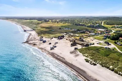 an aerial view of a beach and the ocean at JB293-Fjerritslev-Tyttebaerstien-24 in Fjerritslev