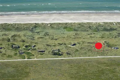 an aerial view of a house with a red circle at JB119-Brovst-Ejstrup-Strandvej-18 in Brovst