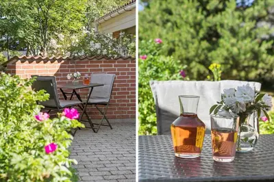 two glass vases sitting on a table with flowers at JB304-Fjerritslev-Landstien-4 in Fjerritslev
