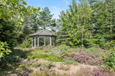 a gazebo in the middle of a garden at JB182-Fjerritslev-Gyvelstien-39 in Fjerritslev