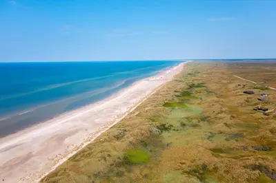 an aerial view of a sandy beach next to the ocean at JB129-Brovst-Strandvejen-150-Lejl-106 in Brovst