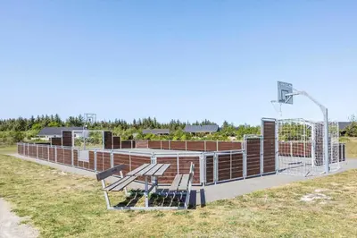 a basketball hoop with two benches and a basket at JB328-Brovst-Kronvildtvej-184 in Brovst