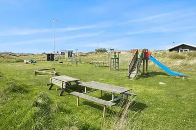 a park with benches and a playground with a slide at JB116-Frostrup-Svenstibakkevej-30 in Frøstrup