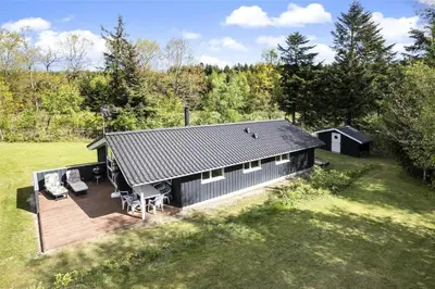 an overhead view of a house with a deck at JB243-Fjerritslev-Aspevej-1 in Fjerritslev